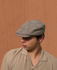 Elevate your winter wardrobe with our Brown & Gray Herringbone Cap, a vintage-inspired masterpiece that effortlessly blends Peaky Blinders style with Gatsby sophistication. Handmade with care, this 8 panels cap is not just an accessory; it's a statement piece that resonates with classic charm. Discover The Versatility Of Our Hat: -Classic herringbone pattern for a timeless look -Handmade with high-quality wool for warmth and durability -Versatile newsboy cap suitable for winter fashion -Gatsby style hat with a touch of vintage elegance -Ideal cabbie hat for a dapper and stylish appearance -Perfect for men seeking both style and warmth Embrace the coziness of the season with our warm wool hat collection. This brown newsboy cap, a baker boy hat with hooligan beret elements, is a unique and t Vintage Winter Baseball Cap For Outdoor, Retro Brown Flat Cap Baseball Cap, Vintage Beige Hat For Outdoors, Vintage Beige Hat For Outdoor, Classic Beige Flat Cap, Winter Classic Baseball Cap With Short Brim, Classic Winter Hat With Visor, Classic Winter Visor Hat, Retro Brown Baseball Cap With Short Brim