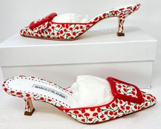 *** New with Box -- Includes Shoe Bag - Sticker residue on outer right sole from removal of price sticker.   MANOLO BLAHNIK - SOLD OUT STYLE Maysale 50 YPRI / BRED Buckle Mule Cotton Twill Floral Pointed Toe Pumps Red Multi Floral Blossoms - Cotton Twill Leather Size 6 US, 36 EU ABSOLUTELY GORGEOUS *** MANOLO BLAHNIK Red Multi Floral Cotton Twill Leather Buckle Mule  Color - Multi Blossom Floral Red - YPRI / BRED Style - Maysalebi 50  Cotton Twill Leather $795.00 Women's - Size US 6, 36 EU   Women's Size 6, EU 36 Description This is the must have shoe of this season and beyond. A timeless staple classic that should be in your wardrobe today, tomorrow, and beyond. A cotton-twill pointy toe in a field of vibrant blossoms makes the nappa leather-covered buckle really pop on this pretty mule p Cute Mules Shoes, Malano Blahnik, Vintage Manolo Blahnik, Malono Blahnik, Manolo Blahnik Kitten Heels, Manolo Blahnik Red, Manolo Blahnik Mules, Manolo Blahnik Maysale, Manolo Blahnik Heels