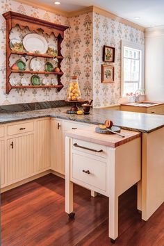 the kitchen is clean and ready to be used for cooking or baking, with an island in the middle