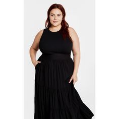 Radiate confidence in the Piper Plain Skirt from our Elevated Essentials collection. Its relaxed fit flatters your figure while the tiered design exudes femininity. No other skirt in your collection will make you feel this comfortable. Bold and fiercely fashionable, no one does plus size fashion like City Chic. Loved around the globe for its diverse range of fashion-forward styles for any occasion. From show-stopping evening gowns to workwear and casualwear, City Chic will take your style to bol Cheap Black Tiered Maxi Skirt, Black Tiered Skirt, Flirty Style, Black Relaxed Hip-length Skirt, Midi Sweater Skirt, Elevated Essentials, Open Stitch Sweater, Plain Skirt, Radiate Confidence, Slip Skirt