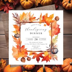 a thanksgiving dinner flyer with autumn leaves and acorns on the table, surrounded by pumpkins