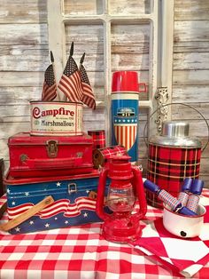 a table topped with lots of red, white and blue items