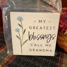 a sign that says, my greatest blessing call me grandma on the inside of it