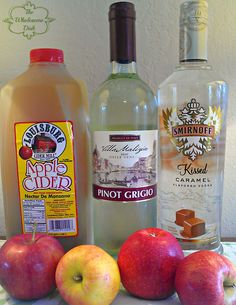 an assortment of fruit and drinks sitting on a table