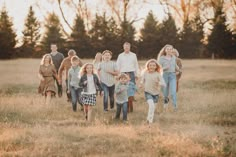 a group of children running through a field