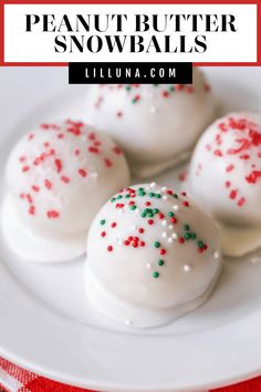 three white chocolate truffles on a plate with red and green sprinkles