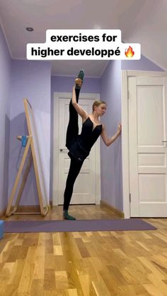 a woman is doing an exercise on her yoga mat in the middle of a room