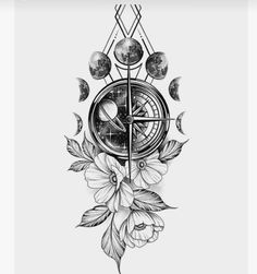 a black and white drawing of a compass with flowers on the bottom half of it