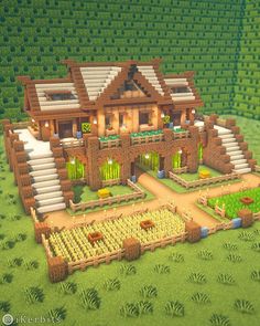 an image of a large house in the middle of a field with lots of plants