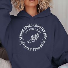 Super soft, cross country senior mom 2025 hoodie sweatshirt. Finish Strong, The Final Mile. Fun to wear all season, especially on xc senior night. The year is changed annually. Links to other versions: Senior: https://www.etsy.com/listing/1767438597/cross-country-senior-hoodie-senior-night Mom: https://www.etsy.com/listing/1767426549/cross-country-senior-mom-hoodie-senior Dad: https://www.etsy.com/listing/1767436955/2025-cross-country-senior-dad-hoodie Shirt: https://www.etsy.com/listing/1762964303/cross-country-senior-night-gifts-2025 Details: This unisex heavy blend hooded sweatshirt is relaxation itself. Made with a thick blend of cotton and polyester, it feels plush, soft and warm, a perfect choice for any cold day. In the front, the spacious kangaroo pocket adds daily practicality whi Senior Night Cross Country Posters, Cross Country Senior Mom Shirt, Cross Country Parent Shirts, Xc Shirts, Cross Country Mom, Finish Strong, Senior Night Gifts