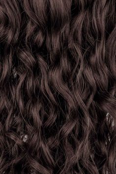 Our Dark Neutral Brown curly clip-in hair extensions blend golden and ash tonescreating a hair color shade that’s the perfectrich balance of warm and coolThese curly extensions are shiny without giving off a specific tone. These easy-to-use Spiral clip-ins are perfect for those with a loose wave texture (like a 2cor soft curls (like a 3A). Our 110-gram set is specifically designed for those with a fine hair type and is great for adding some natural volume to your hairYou can also purchase two s Shiny Curly Hair, Curly Hair Texture, Curly Human Hair Extensions, Light Brown Highlights, Curly Extensions, Brown Curls, Wave Texture, Textured Curly Hair, Curly Clip Ins