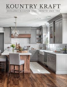 a large kitchen with gray cabinets and white counter tops is featured in the magazine kountry kraff