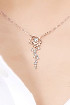 Look like a blooming beauty with this necklace made of 925 sterling silver and adorned with moissanite and 18k rose gold plating. Perfectly polished for a charming touch. Comes with a matching box and features a chain length of 18 inches and pendant diameter of 1.2 inches while weighing in at just 0.1 ounces (0.56 carats). Ghost Mannequin, Diamond Pendants Designs, Pretty Jewelry Necklaces, Picture Style, Drop Pendant Necklace, Jewelry Accessories Ideas, Rose Necklace, Classy Jewelry, Fancy Jewellery