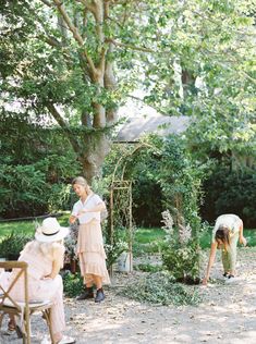 two women are working in the garden together