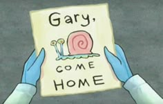 someone holding up a card with a snail on it that says, gary come home