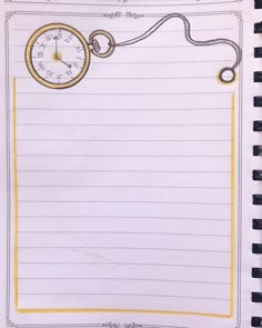 an open notepad with a drawing of a clock on the front and side of it