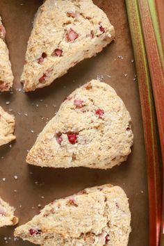 several pieces of scones sitting on top of a pan