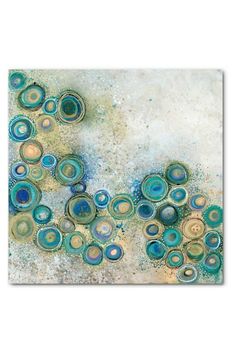 an abstract painting with blue and green circles