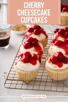 cherry cheesecake cupcakes on a cooling rack