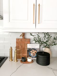 the kitchen counter is clean and ready to be used as a place setting for cooking