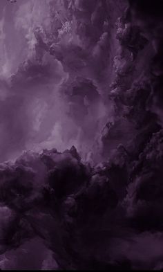 the sky is filled with purple clouds