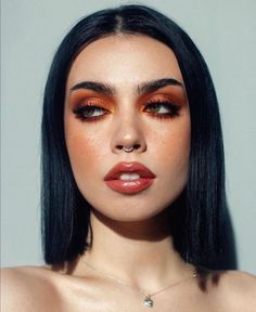 Nature-Inspired Beauty: Easy and Natural Fall Makeup Ideas for Green Eyes in 2023 Bottom Lash Eyeliner Looks, Red 70s Makeup, Bold Orange Eye Makeup, Makeup For Round Eyes Eyeshadows, 70s Inspired Wedding Makeup, Monochrome Eye Makeup, Rust Colored Makeup, Dark Orange Eyeshadow Looks, Black And Orange Makeup Looks