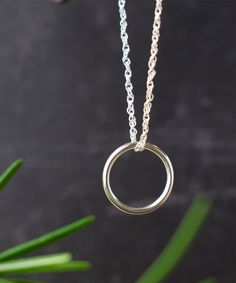 Sterling silver rings necklace |  Gift for mother's day | 18'' chain necklace with ring | Ring holder necklace | Anniversary gift for her Jewelry creates simple minimalist necklace. this necklace comes with a simple band ring which you can customize as per your size and you can enjoy both ring and necklace As you see, it's so dainty to wear and unique. And of course it has a perfect size. The most important is that they are all handmade. Now if you want it, just now, take an order here! * 925 St Chain Necklace To Hold Ring, Ring On Chain Necklaces, Dainty Silver Jewelry Gift For Mom, Minimalist Round Pendant Jewelry For Mother's Day, Dainty Silver Jewelry For Mom, Silver Open Circle Jewelry For Anniversary, Sterling Silver Open Circle Promise Ring, Nickel-free Open Circle Jewelry Gift, Sterling Silver Circle Jewelry Gift