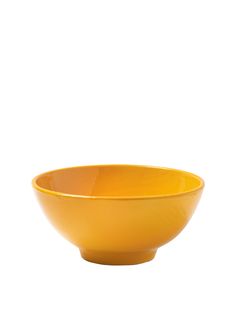 a yellow bowl sitting on top of a white table