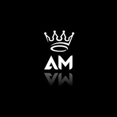 a crown with the word ma on it in white and black, against a dark background