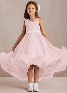 Lottie is a fun one shoulder tulle dress that every flower girl will love to wear. Her one shoulder neckline has beautiful hand pleats and a tulle shoulder strap. A belt adds a delicate touch atop the high low skirt that has tulle ruffle hem that every flower girl would love to dance around with. Pink Flower Girl, Pink Flower Girl Dresses, Tulle Flower Girl, Flower Girl Dresses Tulle, High Low Skirt, Flower Girl Dress, Girl Dresses, Flower Dresses