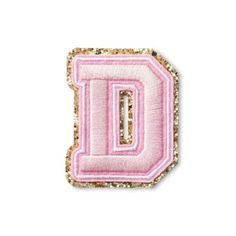 the letter d in pink and gold sequins is shown on a white background