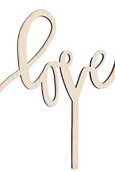 a wooden sign that says love hanging from a string on a white background with the word love spelled in cursive letters