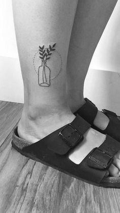 a person with a small tattoo on their foot