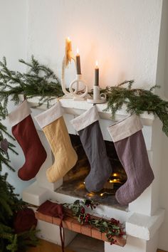 Different Color Christmas Stockings By AmourlInen Linen Christmas Decorations, Cute Stockings Christmas, European Christmas Decor, Linen Stocking, Linen Textiles, Fireplace Walls, Linen Christmas Stocking, Linen Tableware, Charming Kitchen