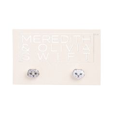 pair of cat earrings in white and silver by meredith & oliva