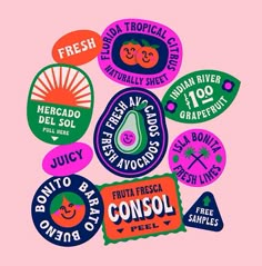 a bunch of stickers that are on a pink background