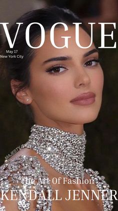 a magazine cover with a beautiful woman wearing a high neck dress and diamond jewelry on it