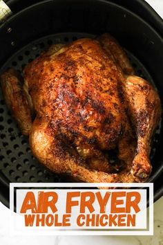 an air fryer whole chicken in a pan with the words, air fryer whole chicken