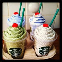 three different types of starbucks drinks on a tray