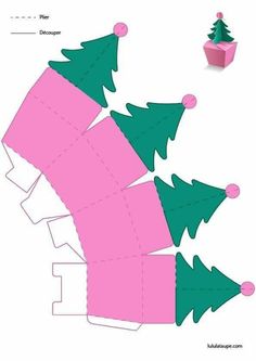 an origami christmas tree is cut out from paper