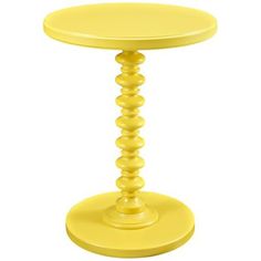 a small yellow table with a circular base