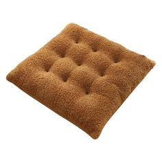 a brown square cushion on a white background