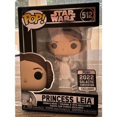 a star wars princess leia pop vinyl figure in its box with the packaging open