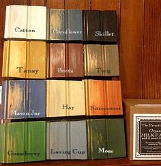 the different shades of paint are shown in this photo, and there is also a box of matches