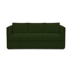 a green couch sitting on top of a white floor