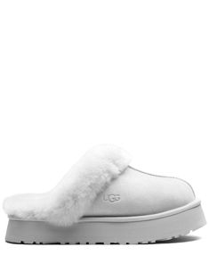 "Find UGG Disquette \"\"goose\"\" Slippers on Editorialist. light grey sheepskin/suede shearling lining embossed logo to the side round toe platform sole These styles are supplied by a premium and authenticated sneaker marketplace. Stocking only the most sought-after footwear, they source and curate some of the most hard to find sneakers from around the world." Goose Slippers, White Uggs, Grey Uggs, Dream Items, Ugg Slides, Grey Slippers, 2024 Wishlist, Wishlist 2024, Digital Closet