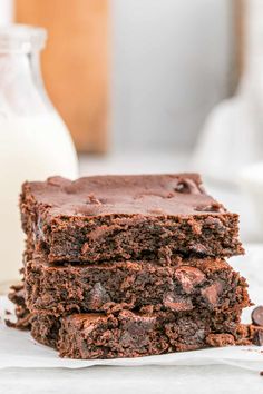 three brownies stacked on top of each other with the words black bean brownies so good