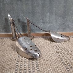 Pair of Small Silver Hammered Metal Shoe Trees / Shoe Forms / Shoe Stretchers | Vintage ECKO Adjustable 8.25" - 11", Set of 2 | Steampunk, Decor DETAILS - Nice vintage pair with great rustic patina and wear - perfect for display.  - Both are marked "ECKO A&J" with the A&J Diamond Logo on the adjusting arm.  - Both work as intended and adjust from approximately 8.25" long to about 11" long - Both are approximately 2-1/8" at widest point. CONDITION - Vintage / pre-owned condition with bits of tarnish, oxidization, and wear  - Could use a good polish if buyer intends to put them back to use as intended - Great pair in as - is shape to use for a display, decor, or photo props Please see all pictures, use zoom, etc., in case we missed anything in the description - and message before buying if y Metal Shoes, Shoe Stretcher, Diamond Logo, Cleaning Items, Shoe Tree, Shoe Insoles, Hammered Metal, Hammered Silver, Shoe Care