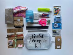 the contents of a bridal emergency kit laid out on a table