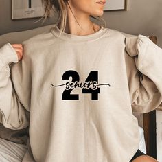 "Celebrate your senior year and the Class of 2024 with our exclusive \"Senior '24 Sweatshirt.\" This stylish sweatshirt is the perfect way to showcase your pride in this significant milestone. 🎓 Class of 2024 Pride: Wear your graduation year with pride. Our \"Senior '24\" sweatshirt is designed to help you celebrate your senior status and your impending graduation. 👕 Comfort and Quality: We've crafted this sweatshirt with your comfort in mind. It features high-quality materials for a soft and Senior Sweaters, Seniors 2024, Senior Year Things, Senior Sweatshirts, Nursing Graduation Pictures, Sweater Designs, Year Sweatshirt